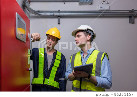 Engineer or technician work checking Fire suppression system and fire equipment. 95251157