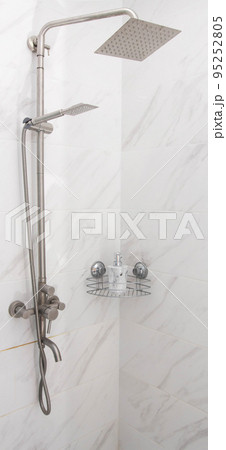 Modern square shower head with large and small head. Relaxation in the shower 95252805