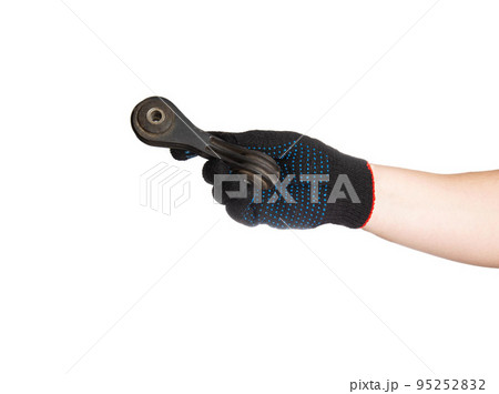 Car spare part with suspension, stabilizer bar in the hand of a car mechanic on a white background, isolate. Close-up 95252832