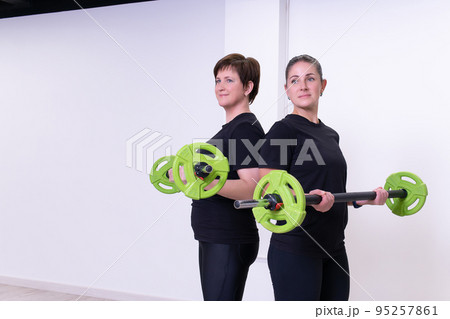 Group training lesson barbell gym pump aerobics sport workout, for, muscles power fun Group training lesson barbell gym pump aerobics sport workout, for, muscles power fun 95257861