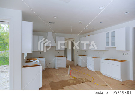 Installation of beautiful kitchen cabinet drawer in new house Installation of beautiful kitchen cabinet drawer in new house 95259381