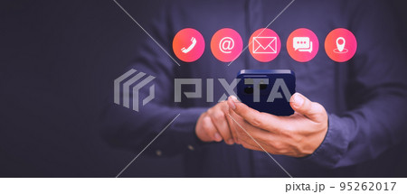 Businessman using mobile phone or smartphone with the call phone, email, address, chat message and map icons. Customer support hotline contact us people connection concept. 95262017