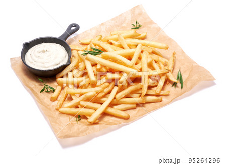 French fries potatoes on parchment paper isolated on white background French fries potatoes on parchment paper isolated on white background 95264296