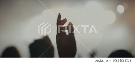 Blurry background picture of hand reaching out for God's help, good for your multimedia content background 95265818
