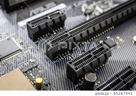 closeup of Pci expess port slot on modern black motherboard. Select focus 95267441