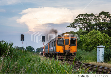 Diesel train for transporting passengers that countryside in Thailand in the evening. Diesel train for transporting passengers that countryside in Thailand in the evening. 95267599