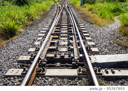 Railroad intersections with alternating machines in countryside Thailand 95267603