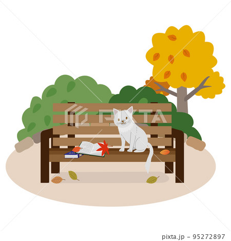 ベンチの上の本と猫　秋 95272897