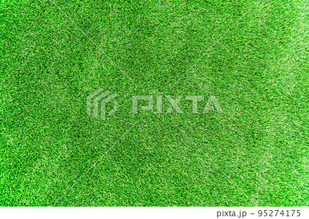 Green artificial turf. Artificial grass background, Top view of artificial grass background. Green artificial turf. Artificial grass background, Top view of artificial grass background. 95274175