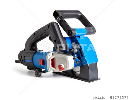 Powerful electric wall chaser for recessing in walls with two diamond blades for reinforced concrete. White background, isolate. Installer's power tool, close-up Powerful electric wall chaser for recessing in walls with two diamond blades for reinforced concrete. White background, isolate. Installer's power tool, close-up 95275572