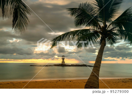 lighthouse building with coconut trees on beach at sunset, Phang Nga lighthouse building with coconut trees on beach at sunset, Phang Nga 95279300