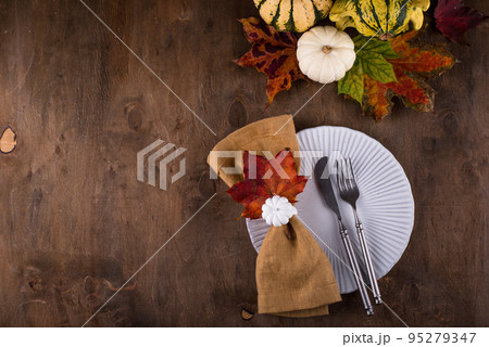 Autumn fall Thanksgiving table setting Autumn fall Thanksgiving table setting 95279347