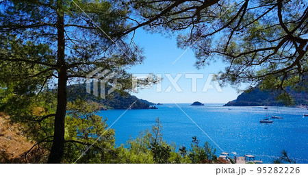 Icmeler Beach view in Marmaris Town. Summer landscape on the Mediterranean coast in Turkey. Icmeler Beach view in Marmaris Town. Summer landscape on the Mediterranean coast in Turkey. 95282226