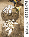 Dried fish on the basket  95283476