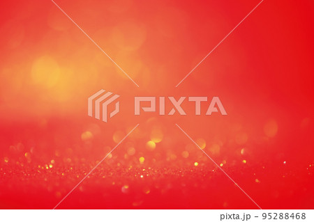Orange glitter background defocused and narrow focal part. Material for designers is shiny orange. Orange glitter background defocused and narrow focal part. Material for designers is shiny orange. 95288468