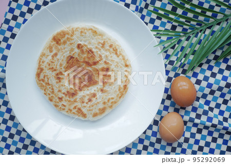 homemade roti chapati and egg on table . homemade roti chapati and egg on table . 95292069