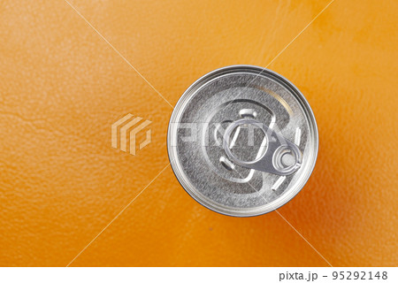 close up of a food can on orange background , close up of a food can on orange background , 95292148