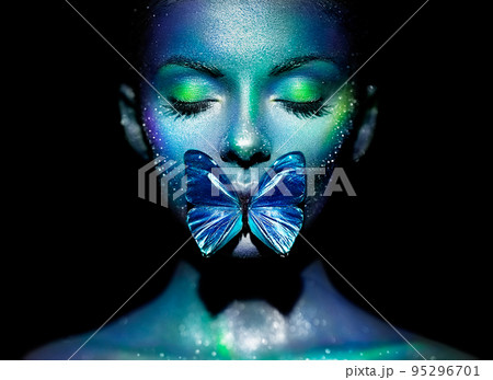 Beauty model woman with violet butterfly 95296701