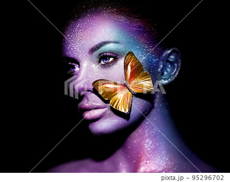 Beauty model woman with violet butterfly Beauty model woman with violet butterfly 95296702