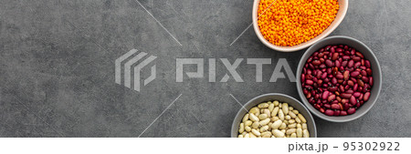 Different types of legumes in bowls 95302922