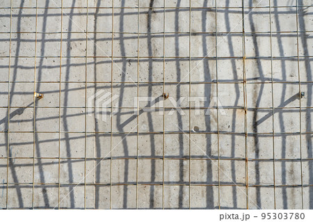 old metal grille with rust isolated on a natural wall background. old metal grille with rust isolated on a natural wall background. 95303780