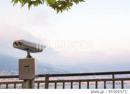 Binocular against observation deck view. 95305373