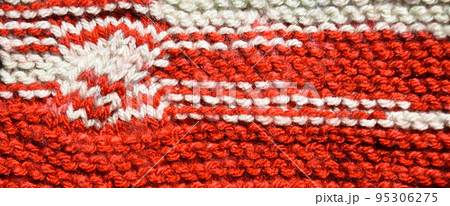Handmade knitted fabric red wool background texture 95306275