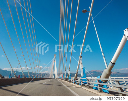 Driving Rion-Antirion Bridge mountain road, Greece 95307399