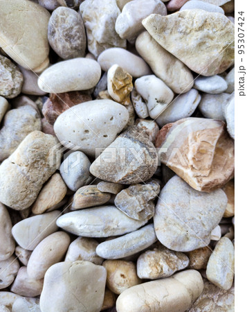 Ionian sea pebble marble beach close-up texture Ionian sea pebble marble beach close-up texture 95307424