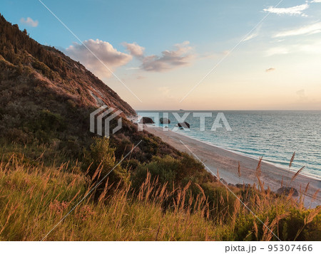 Beach Megali Petra in sunset Lefkada island Greece Beach Megali Petra in sunset Lefkada island Greece 95307466
