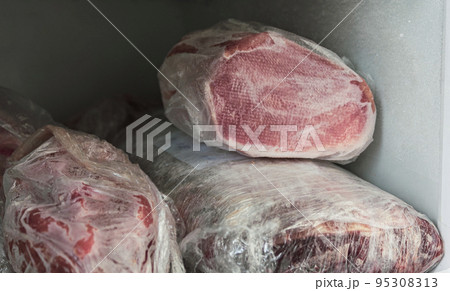 Home refrigerator with different packaged frozen meat. Home refrigerator with different packaged frozen meat. 95308313