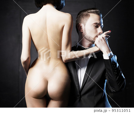 Fashion studio photo of a sensual couple 95311051