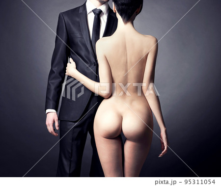 Fashion studio photo of a sensual couple 95311054