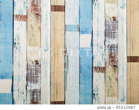 Wood planks, multicolor effective wood texture, Old wooden planks in multi-pastel colours with vintage style for background and texture. Beautiful wooden striped background painted with pastel paint. Wood planks, multicolor effective wood texture, Old wooden planks in multi-pastel colours with vintage style for background and texture. Beautiful wooden striped background painted with pastel paint. 95312067