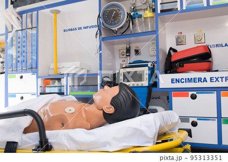 ambulance perfectly equipped with emergency equipment and dummy for first aid practices 95313351