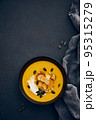 Pumpkin cream soup top view copy space 95315279