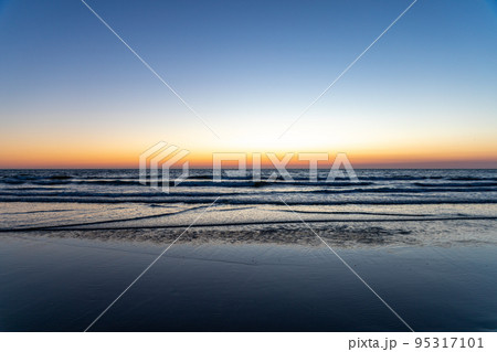 Sundown at the Dutch coastline between Noordwijk and Zandvoort. 95317101