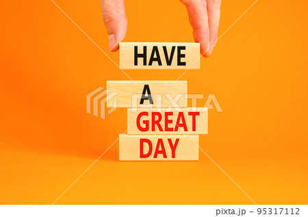 Have a great day symbol. Concept words Have a great day on wooden blocks. Beautiful orange table orange background. Businessman hand. Business, psychological Have a great day concept. Copy space. 95317112