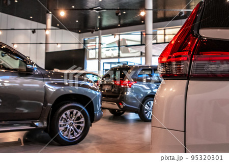 Brand new cars at the dealer showroom 95320301