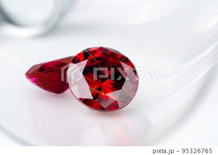 Red Ruby gemstone Round Cut isolate on white background, close up shot 95326765
