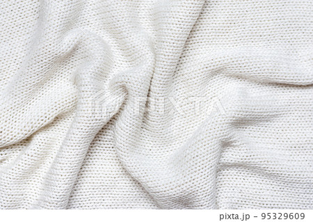 White macro photo of textured jersey and knitting of sweater or sweatshirt. Pattern and background for fashion Warm Autumn concept. 95329609