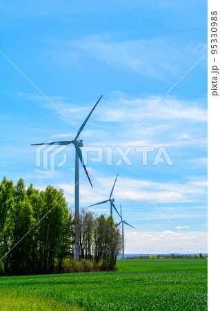 windmill wind turbines in field, power generator electric pylon wind turbine 95330988