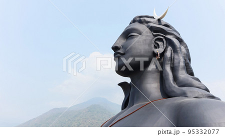 Side View of Adiyogi Shiva Statue, 34 meter tall statue designed by Sadhguru Jaggi Vasudev, Inaugurated in 2017. Located at Booluvampatti, 35 kms from Coimbatore, Tamilnadu, India Side View of Adiyogi Shiva Statue, 34 meter tall statue designed by Sadhguru Jaggi Vasudev, Inaugurated in 2017. Located at Booluvampatti, 35 kms from Coimbatore, Tamilnadu, India 95332077