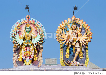 Statue of Aadi Shakti Goddess Durga and Lord Shiva on entrance of Nataraja Temple, Chidambaram, Tamil Nadu, India Statue of Aadi Shakti Goddess Durga and Lord Shiva on entrance of Nataraja Temple, Chidambaram, Tamil Nadu, India 95332175