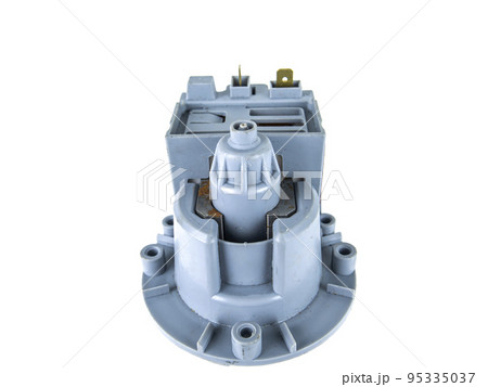 Motor pump with impeller of a washing machine on a white background. Motor pump with impeller of a washing machine on a white background. 95335037