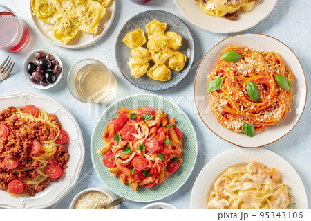 Pasta, many different varieties, overhead flat lay shot. Italian food and drinks Pasta, many different varieties, overhead flat lay shot. Italian food and drinks 95343106