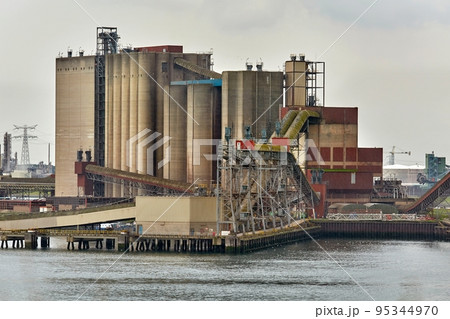 Industrial harbor with rusty structures 95344970