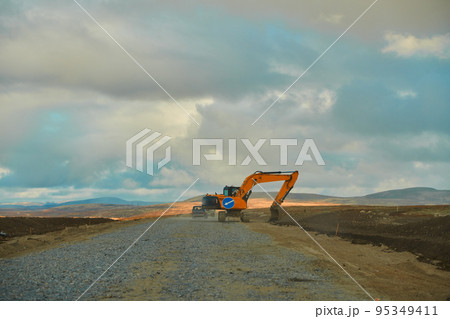 Road running between arctic hills. Autumn season 95349411
