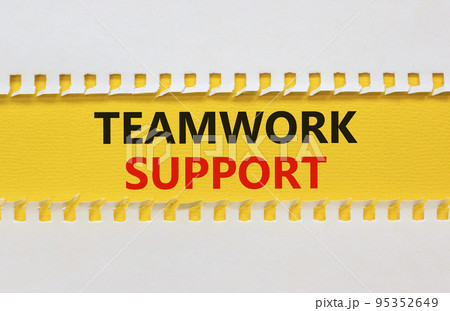 Teamwork support symbol. Concept words Teamwork support on yellow paper on a beautiful white background. Business and teamwork support concept. Copy space. 95352649