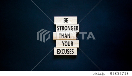 Be stronger symbol. Concept words Be stronger than your excuses on wooden blocks on a beautiful black table black background. Copy space. Business motivational and be stronger concept. Be stronger symbol. Concept words Be stronger than your excuses on wooden blocks on a beautiful black table black background. Copy space. Business motivational and be stronger concept. 95352713